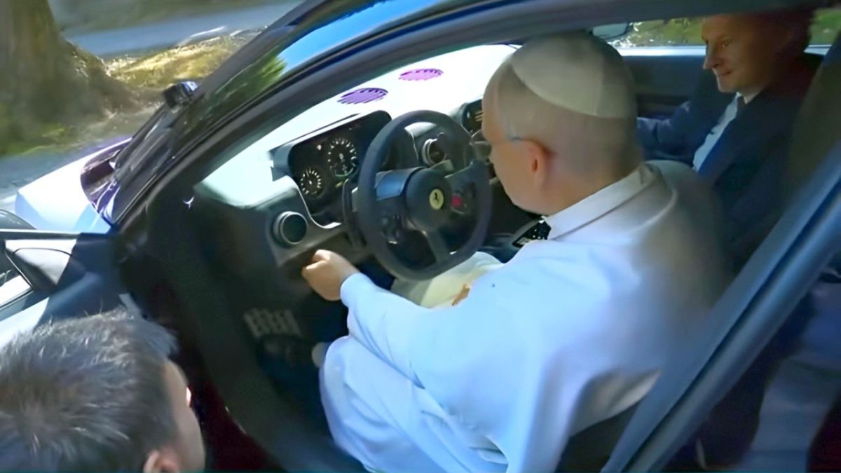 Pope Francis gets behind the wheel of Ferrari's first all-electric Luce