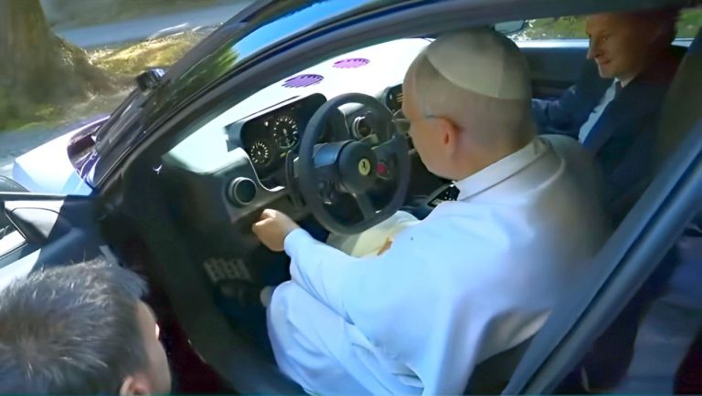 Pope Francis gets behind the wheel of Ferrari's first all-electric Luce