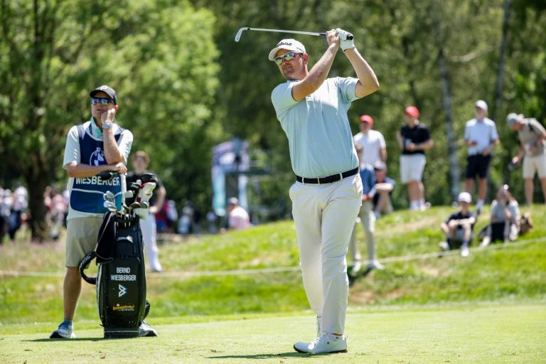 BMW International Open: Wiesberger and Hollick Lead as Storm Clouds Gather
